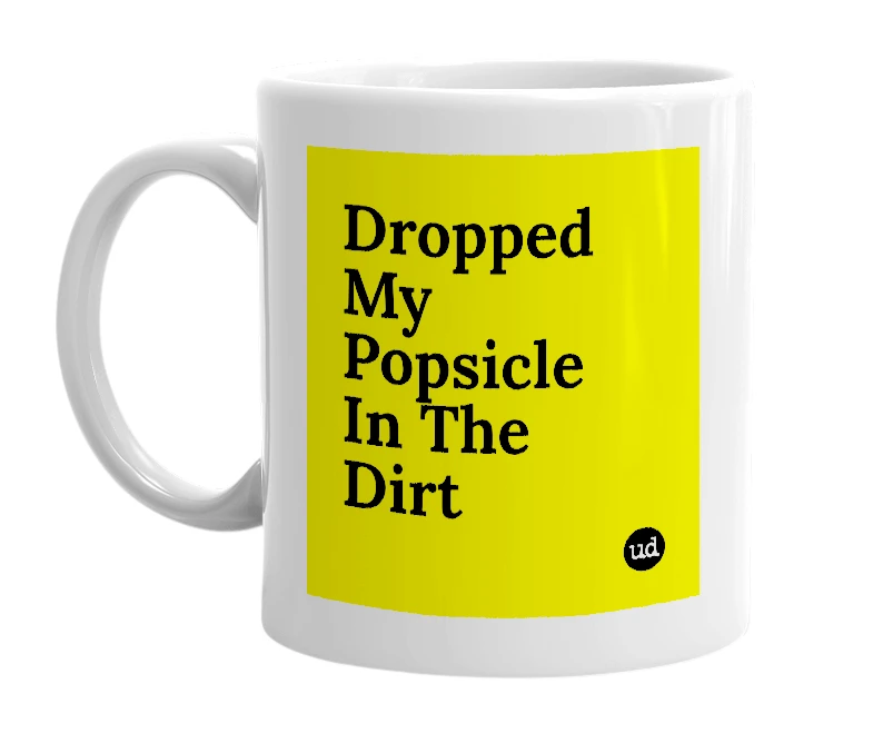 White mug with 'Dropped My Popsicle In The Dirt' in bold black letters