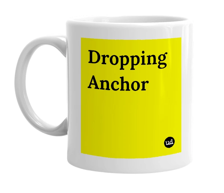 White mug with 'Dropping Anchor' in bold black letters