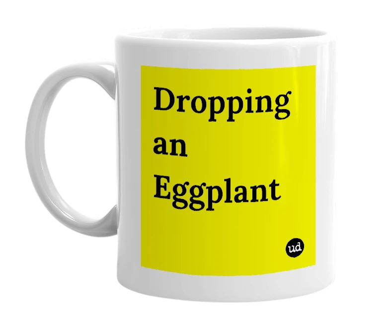 White mug with 'Dropping an Eggplant' in bold black letters