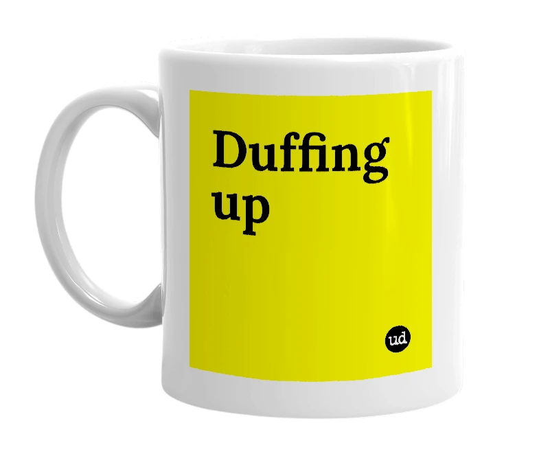 White mug with 'Duffing up' in bold black letters