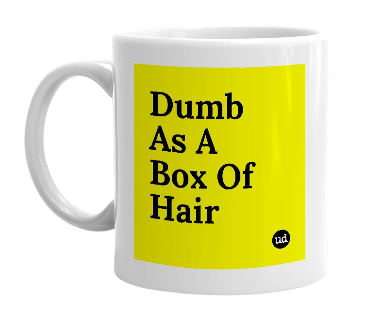 White mug with 'Dumb As A Box Of Hair' in bold black letters