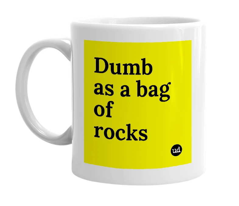 White mug with 'Dumb as a bag of rocks' in bold black letters
