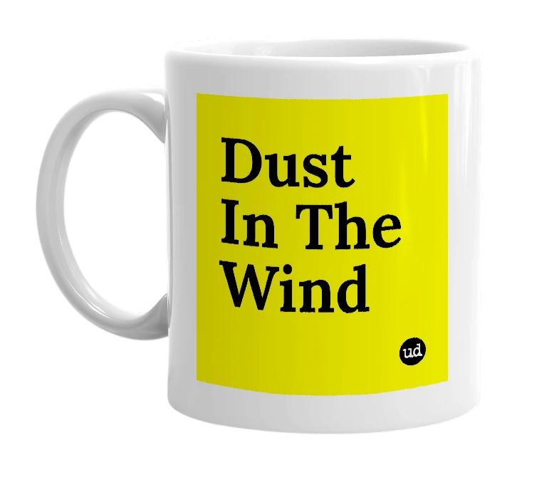 White mug with 'Dust In The Wind' in bold black letters