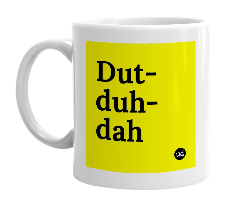 White mug with 'Dut-duh-dah' in bold black letters