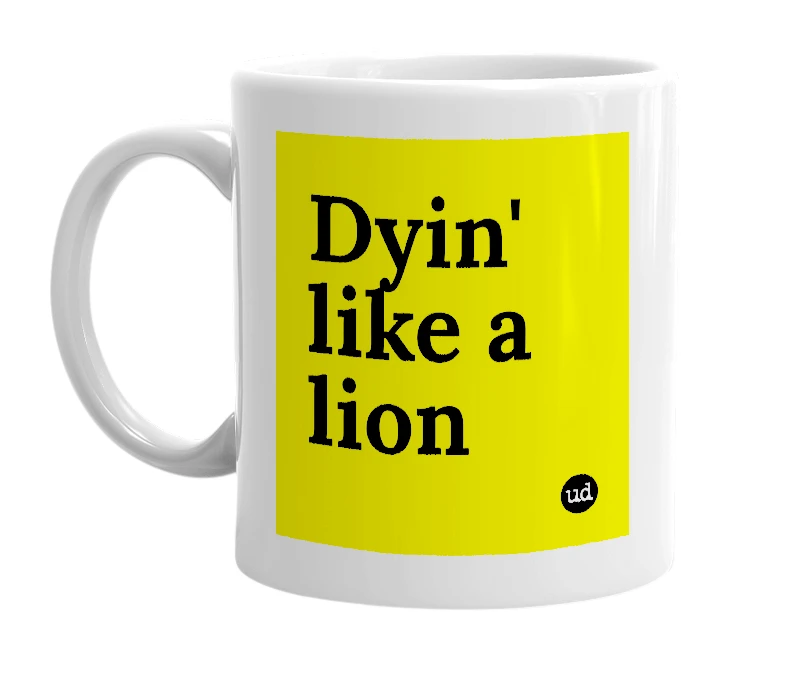 White mug with 'Dyin' like a lion' in bold black letters