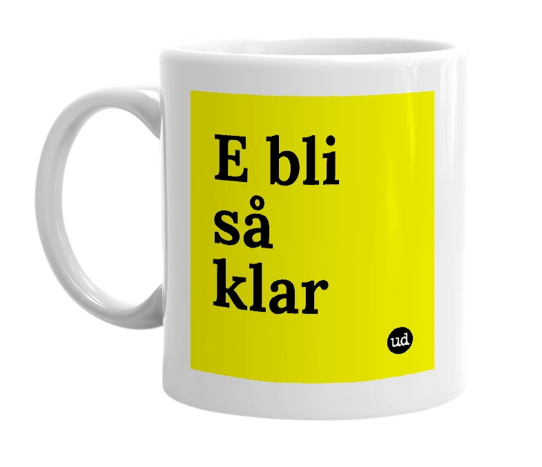 White mug with 'E bli så klar' in bold black letters