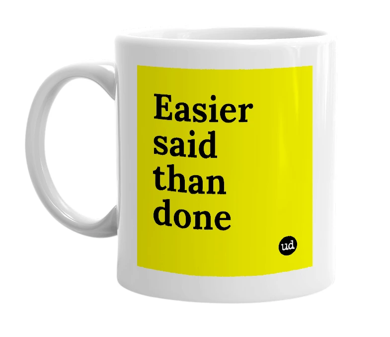 White mug with 'Easier said than done' in bold black letters