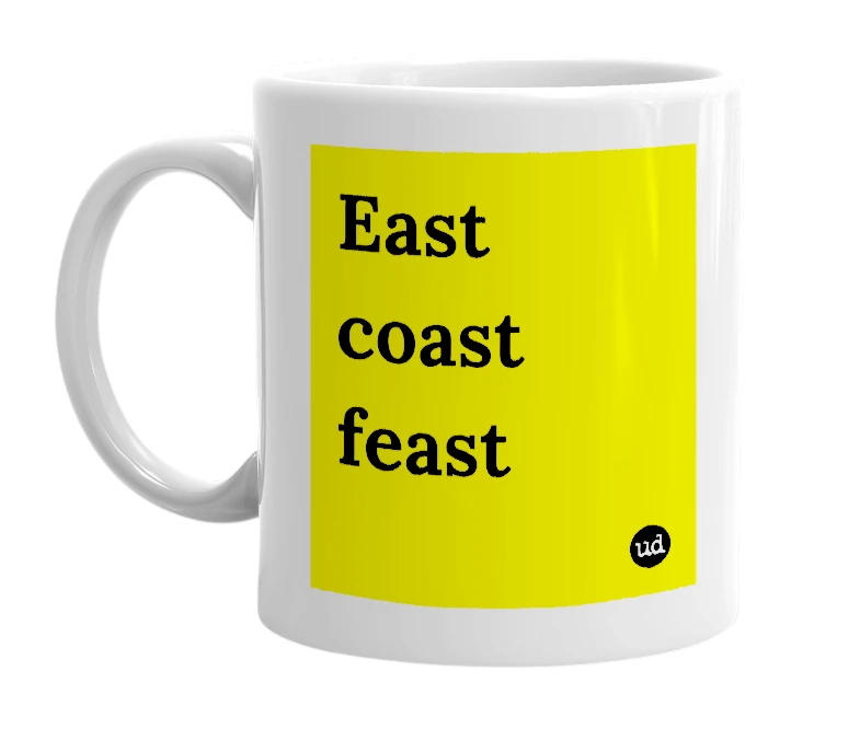 White mug with 'East coast feast' in bold black letters