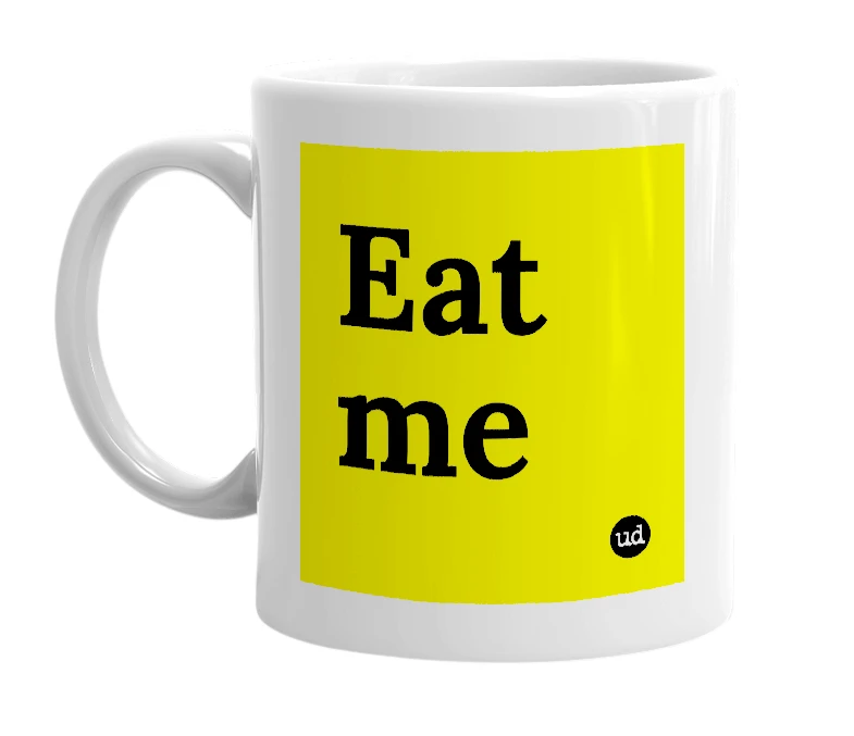 White mug with 'Eat me' in bold black letters