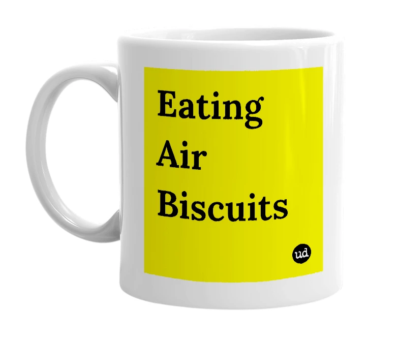 White mug with 'Eating Air Biscuits' in bold black letters