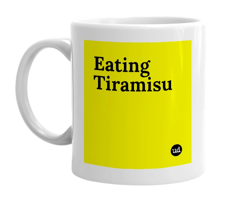 White mug with 'Eating Tiramisu' in bold black letters
