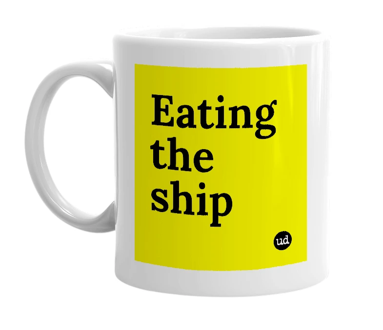White mug with 'Eating the ship' in bold black letters