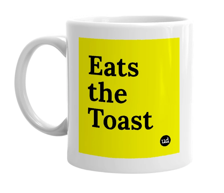 White mug with 'Eats the Toast' in bold black letters