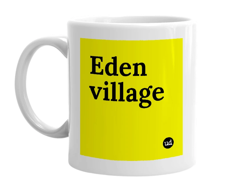 White mug with 'Eden village' in bold black letters