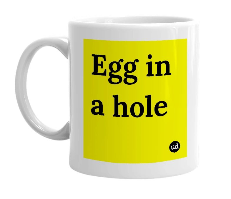 White mug with 'Egg in a hole' in bold black letters