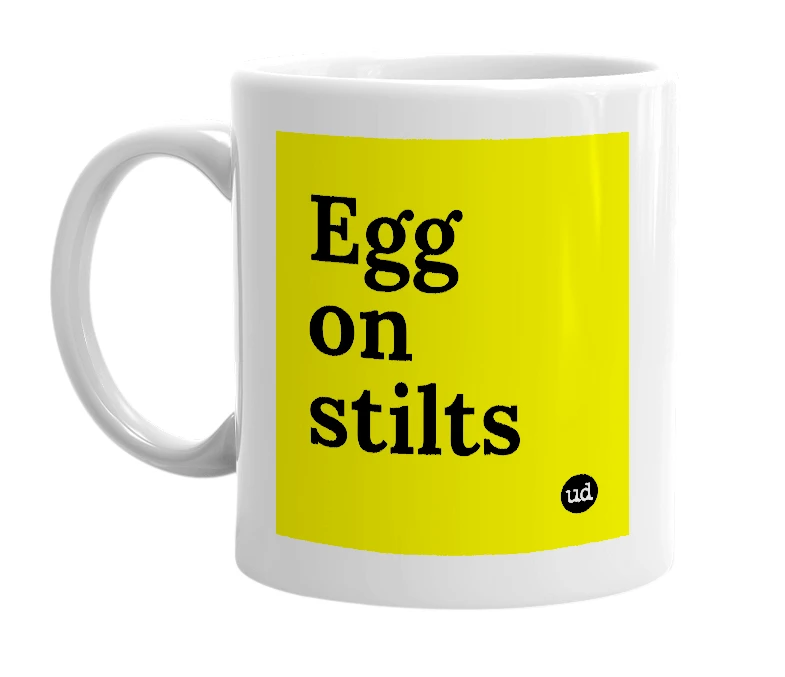 White mug with 'Egg on stilts' in bold black letters