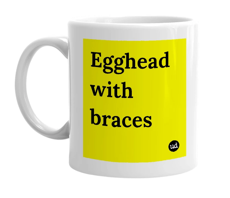 White mug with 'Egghead with braces' in bold black letters