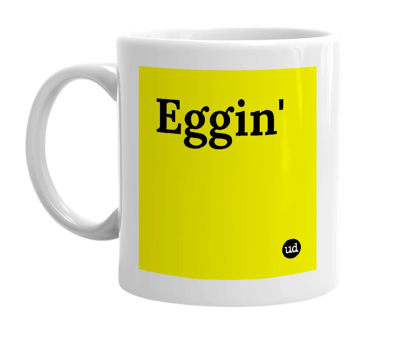 White mug with 'Eggin'' in bold black letters