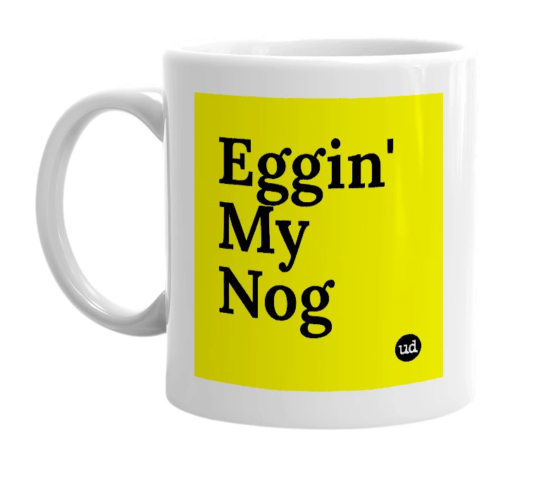 White mug with 'Eggin' My Nog' in bold black letters