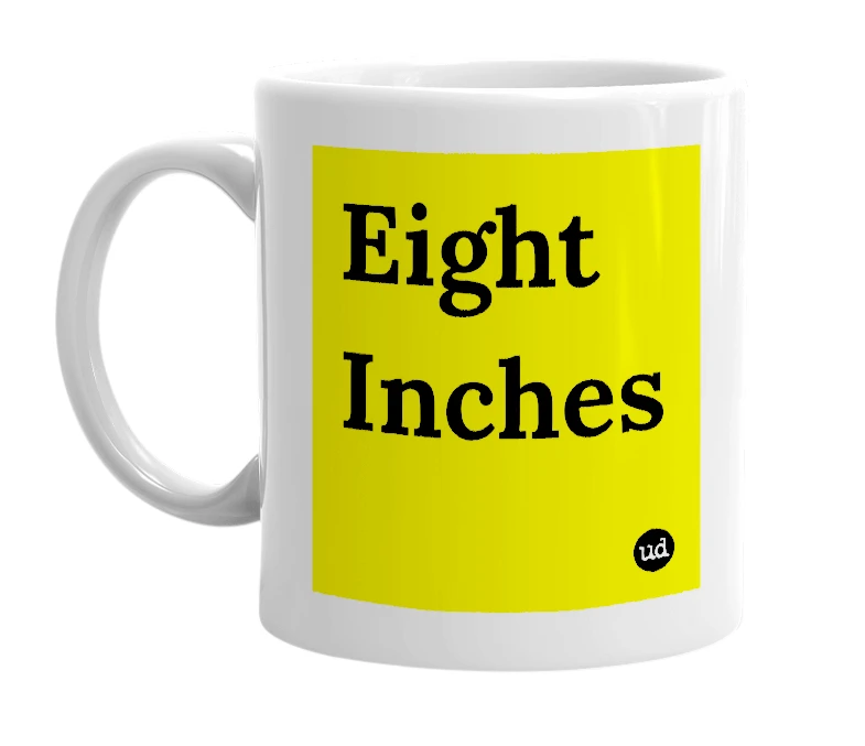 White mug with 'Eight Inches' in bold black letters