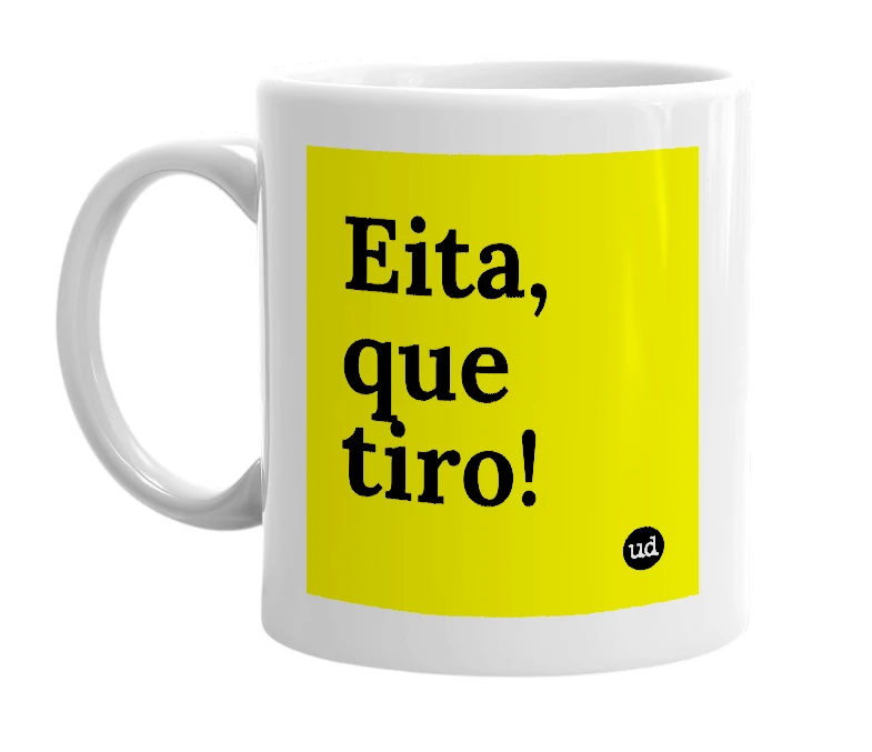 White mug with 'Eita, que tiro!' in bold black letters