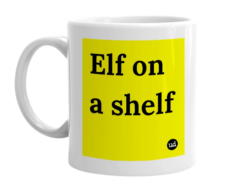 White mug with 'Elf on a shelf' in bold black letters
