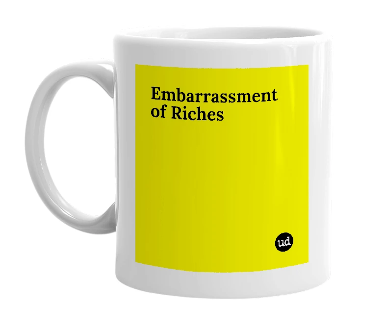 White mug with 'Embarrassment of Riches' in bold black letters