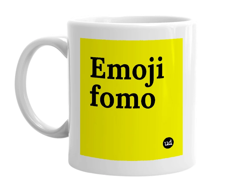 White mug with 'Emoji fomo' in bold black letters