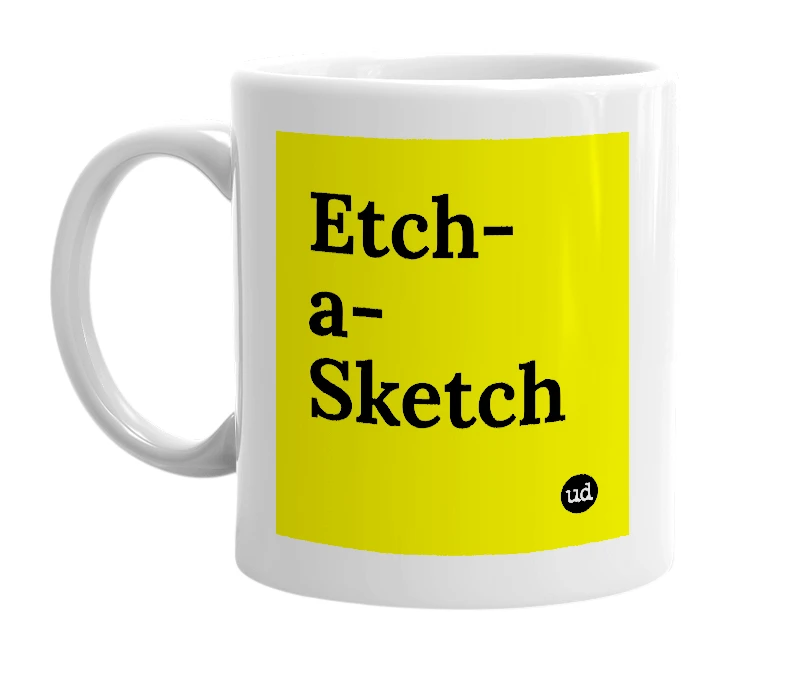 White mug with 'Etch-a-Sketch' in bold black letters