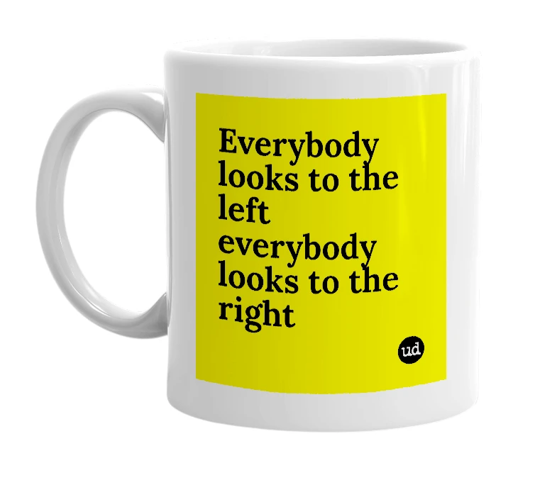 White mug with 'Everybody looks to the left everybody looks to the right' in bold black letters
