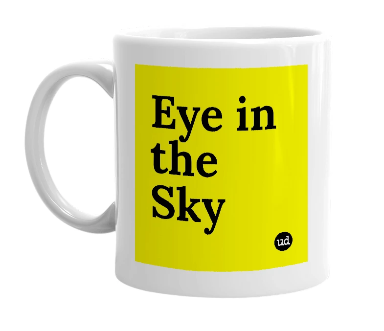 White mug with 'Eye in the Sky' in bold black letters