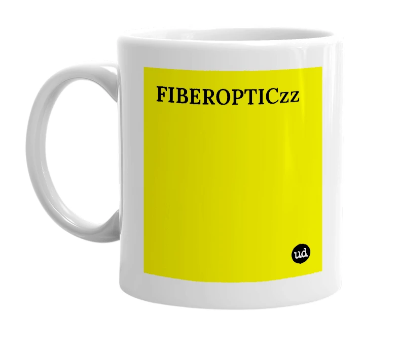 White mug with 'FIBEROPTICzz' in bold black letters