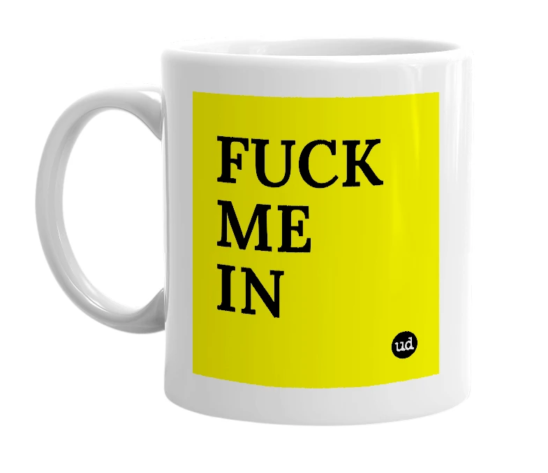 White mug with 'FUCK ME IN' in bold black letters