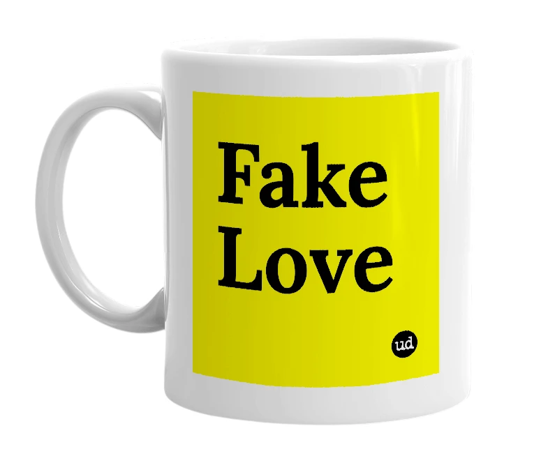 White mug with 'Fake Love' in bold black letters