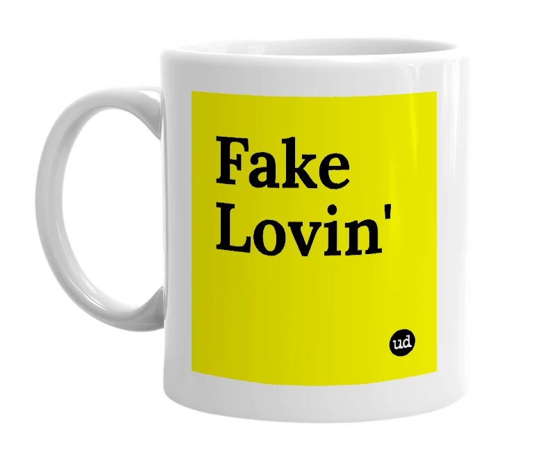 White mug with 'Fake Lovin'' in bold black letters