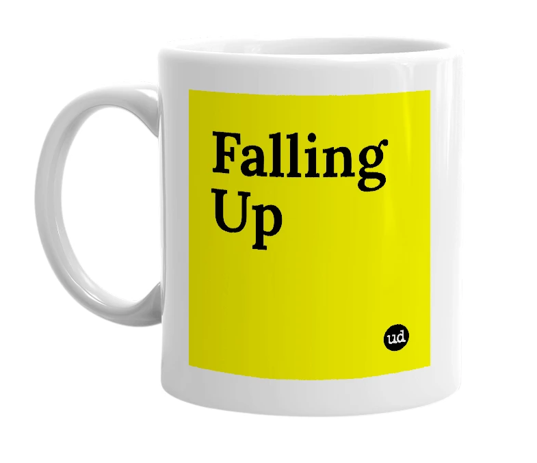 White mug with 'Falling Up' in bold black letters