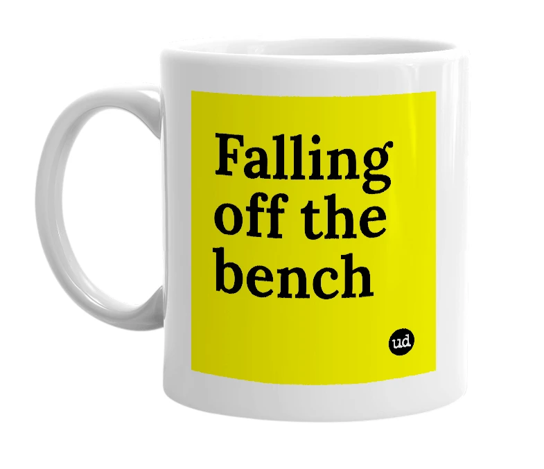 White mug with 'Falling off the bench' in bold black letters