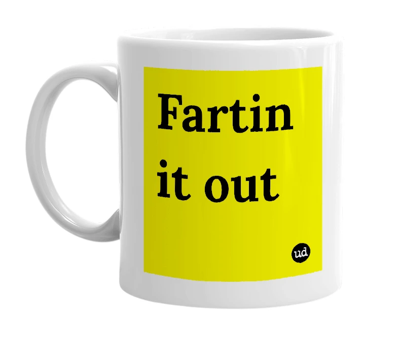 White mug with 'Fartin it out' in bold black letters