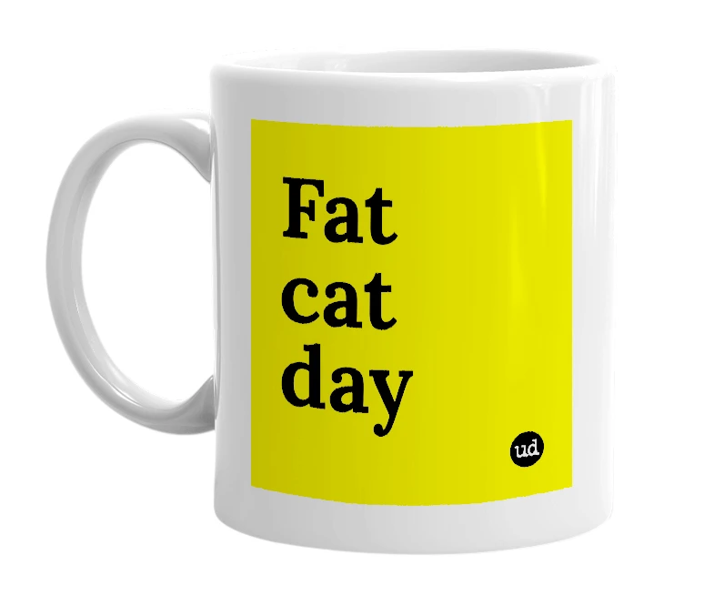 White mug with 'Fat cat day' in bold black letters