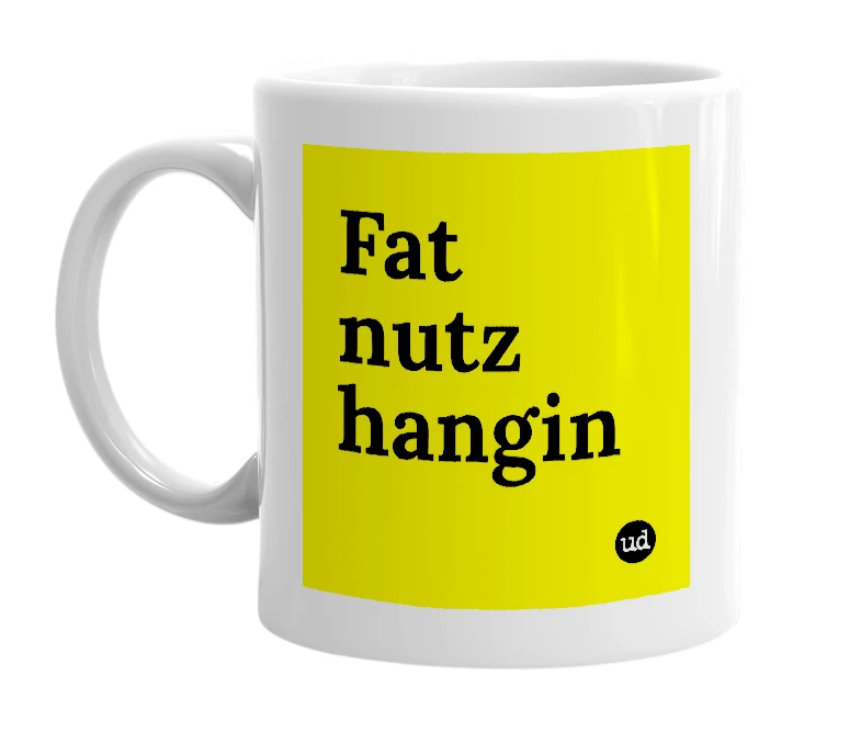 White mug with 'Fat nutz hangin' in bold black letters