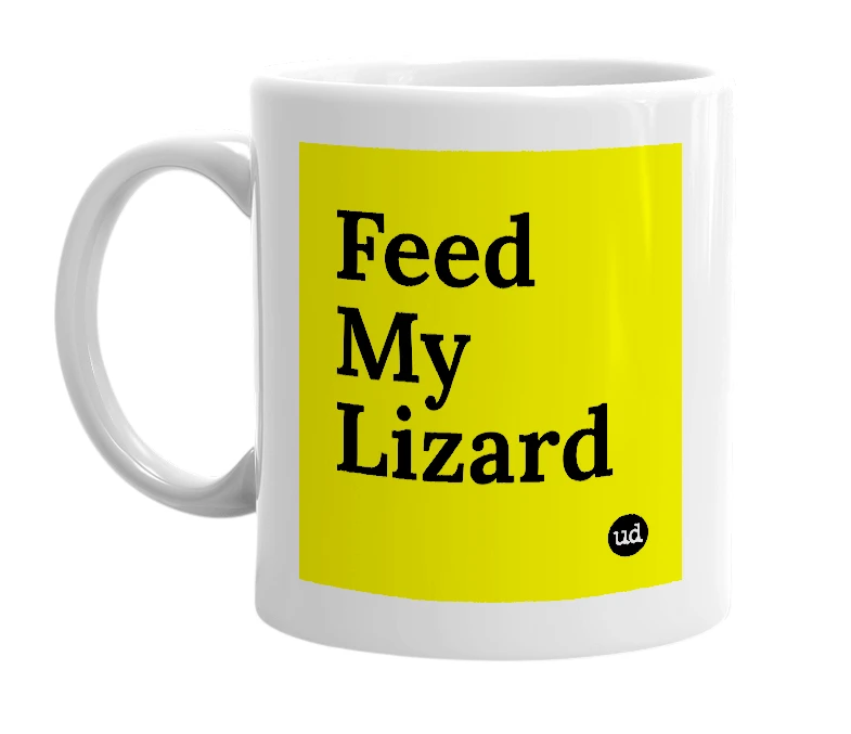 White mug with 'Feed My Lizard' in bold black letters