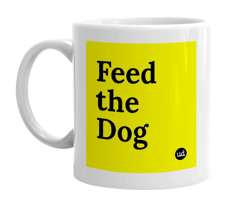 White mug with 'Feed the Dog' in bold black letters