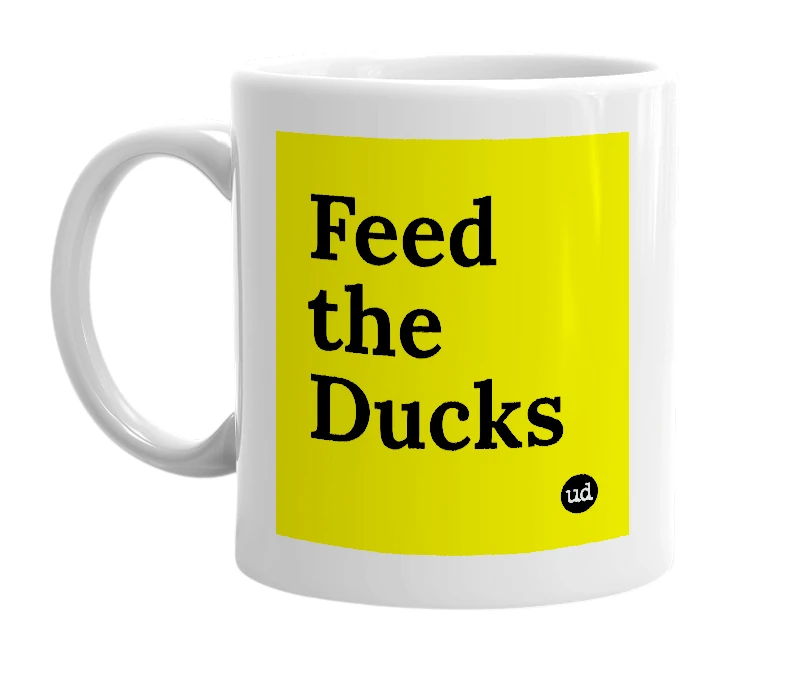 White mug with 'Feed the Ducks' in bold black letters
