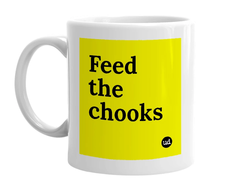 White mug with 'Feed the chooks' in bold black letters