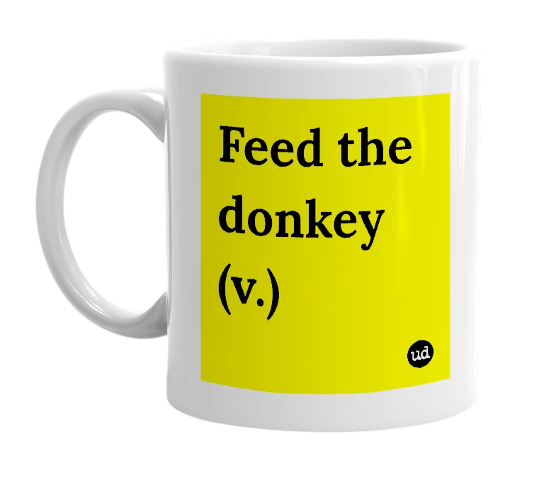 White mug with 'Feed the donkey (v.)' in bold black letters