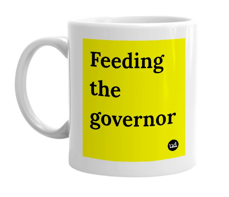 White mug with 'Feeding the governor' in bold black letters