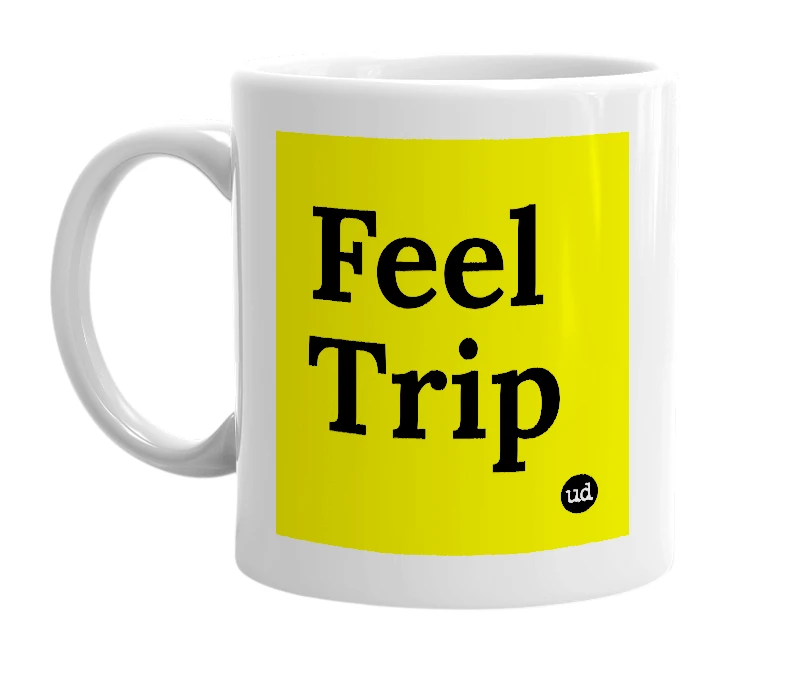 White mug with 'Feel Trip' in bold black letters