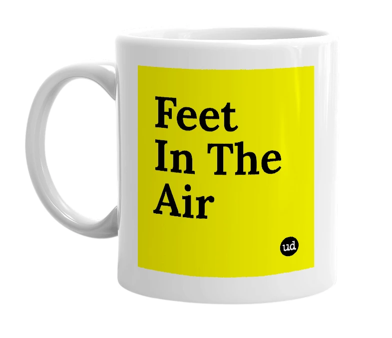 White mug with 'Feet In The Air' in bold black letters