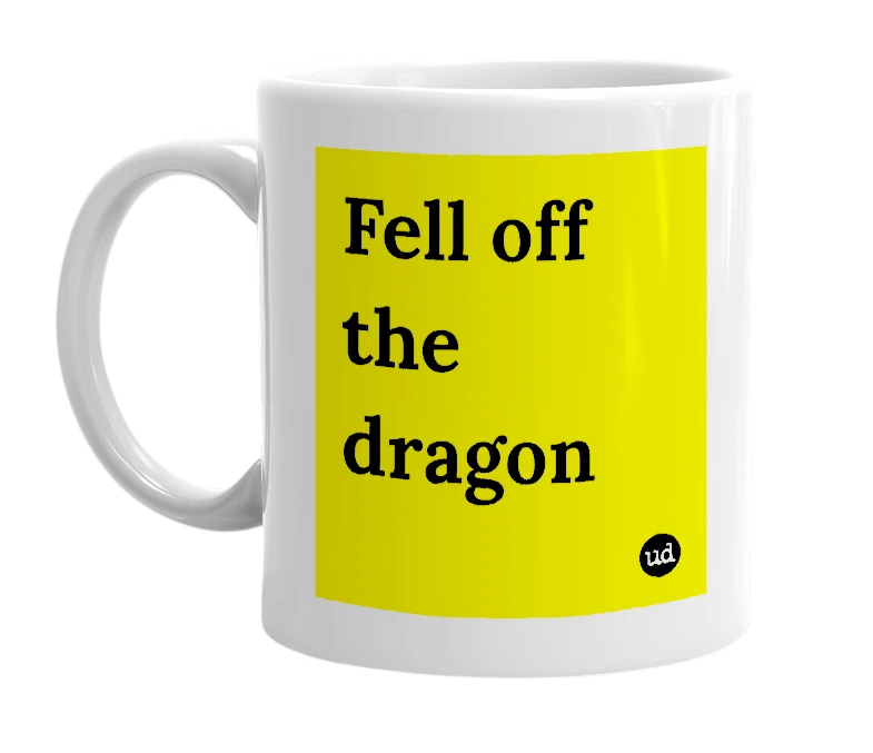 White mug with 'Fell off the dragon' in bold black letters