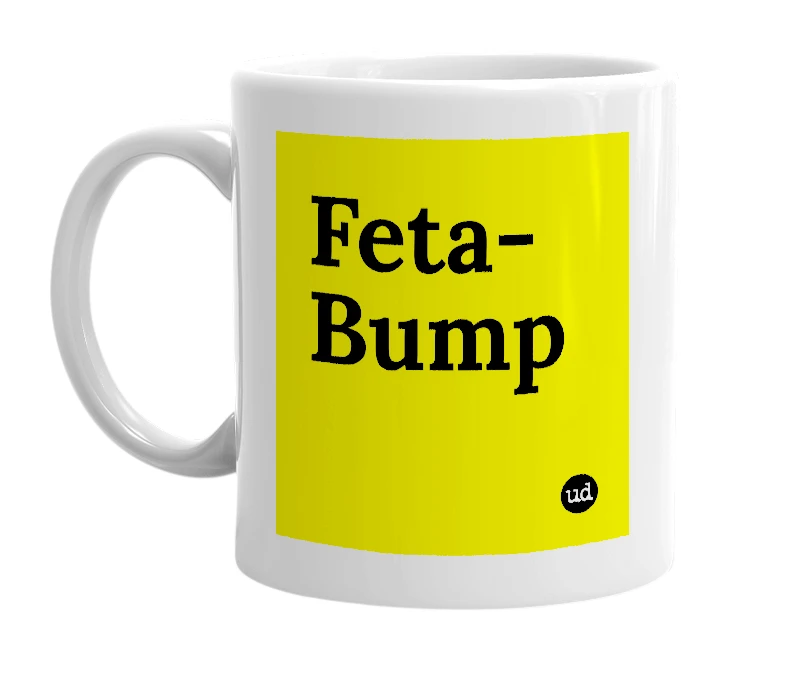 White mug with 'Feta-Bump' in bold black letters